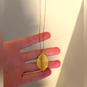 Dainty gold leaf necklace from Anthropologie